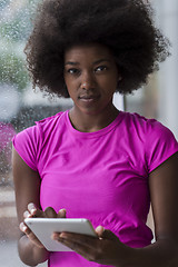 Image showing african american woman using tablet