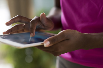 Image showing african american woman using tablet