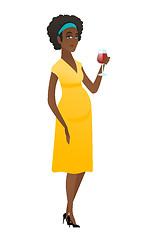 Image showing Young pregnant woman holding a glass of wine.