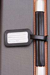 Image showing Black Luggage Tag On Baggage