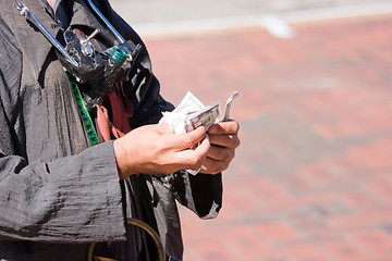 Image showing Counting The Money