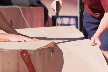 Image showing Sawing Wood