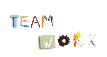 Image showing The words team work created from office stationery.