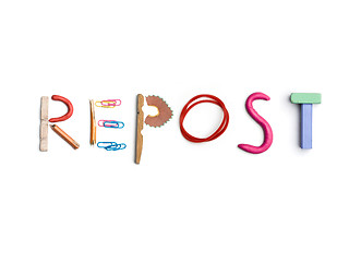 Image showing The word repost created from office stationery.