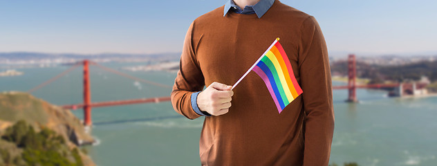 Image showing close up of man with gay pride rainbow flag