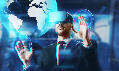 Image showing businessman in virtual reality headset with earth