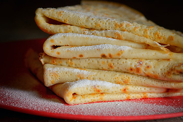 Image showing Homemade pancakes and powder sugar