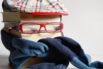 Image showing Reading glasses with books and neckerchief