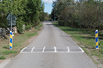 Image showing Road bump on a country road