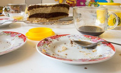 Image showing Dirty dishes on the table after home tea