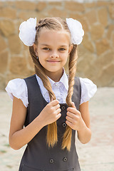 Image showing Portrait of a schoolgirl on the holiday September 1 at the school