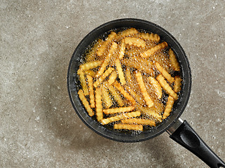 Image showing frying potatoes in a pan