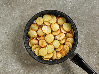 Image showing frying potatoes in a pan