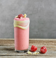 Image showing glass of strawberry milkshake