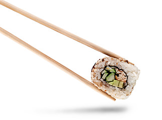 Image showing Sushi roll of california with chopsticks