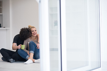 Image showing young couple in their new home