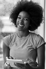 Image showing african american woman using tablet