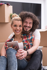 Image showing young couple moving  in new house