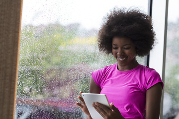 Image showing african american woman using tablet