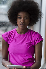 Image showing african american woman using tablet