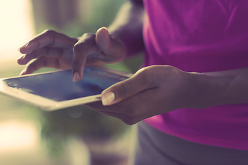 Image showing african american woman using tablet