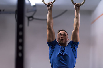 Image showing man doing dipping exercise