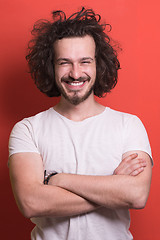 Image showing young man with funny hair over color background