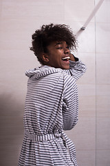 Image showing beautiful black woman wearing  bathrobe