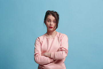 Image showing Beautiful bored woman bored isolated on blue background