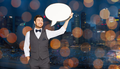 Image showing man with blank text bubble over singapore city