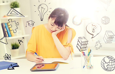 Image showing bored asian woman student with tablet pc at home