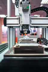 Image showing CNC Laser cutting of metal, modern industrial technology.