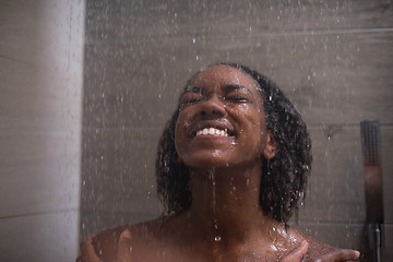 Image showing African American woman in the shower