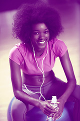 Image showing woman  relaxing after pilates workout