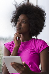 Image showing african american woman using tablet