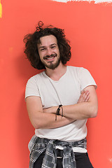 Image showing young man with funny hair over color background