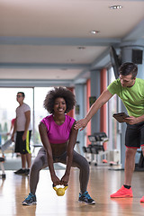 Image showing weights workout with personal trainer at  crossfit gym