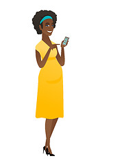 Image showing African pregnant woman holding a mobile phone.