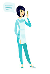 Image showing Young asian cleaner with speech bubble.