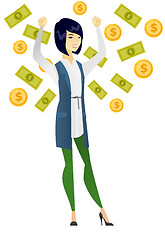 Image showing Happy busiess woman under money rain.