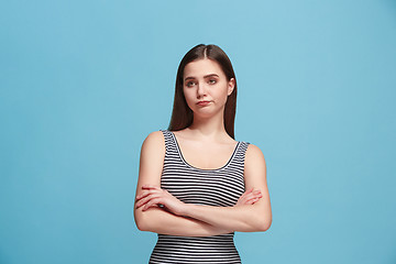 Image showing Beautiful bored woman bored isolated on blue background