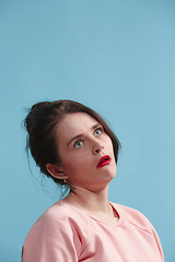 Image showing Beautiful bored woman bored isolated on blue background