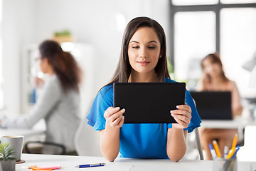 Image showing businesswoman with tablet pc working at office