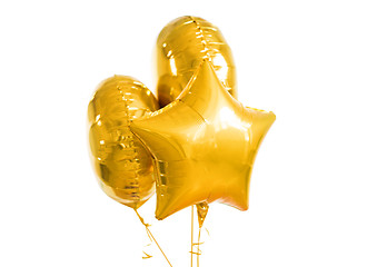 Image showing close up of helium balloons over white background