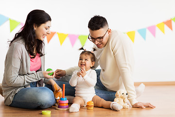 Image showing baby girl with parents playing with toys