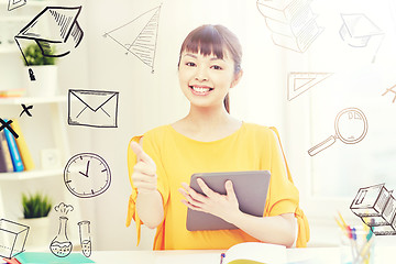 Image showing happy asian woman student with tablet pc at home