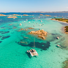 Image showing Drone aerial view of catamaran sailing boat in Maddalena Archipelago, Sardinia, Italy.