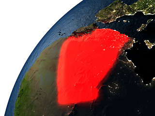 Image showing Algeria in red on Earth at night