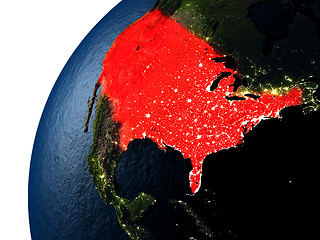 Image showing USA in red on Earth at night