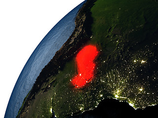 Image showing Paraguay in red on Earth at night